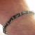 Black rubber Oring, gunmetal color rings single row bracelet $10.00