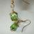 Green Swarovski cubes, these are a beautiful color, peridot, with gold plated round bead caps. It gives the an unusual shape.. at first glance they appear octogon shaped. Other colors can be substituted, just contact me. On french wires.  $16.00