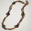 Smoky quartz, Swarovski "crystal copper" beads, small faceted round tigereye beads,  and copper accents make up this gorgeous necklace. It is SO pretty in person. Matching bracelet is available. 75.00